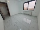 Duplex last floor with roof for sale in Qaryet Al-Nakheel, of 235m