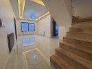 Duplex last floor with roof for sale in Qaryet Al-Nakheel, of 235m