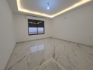 Duplex last floor with roof for sale in Qaryet Al-Nakheel, of 235m